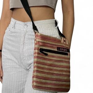 Dakine Gold and Pink Striped Crossbody Bag